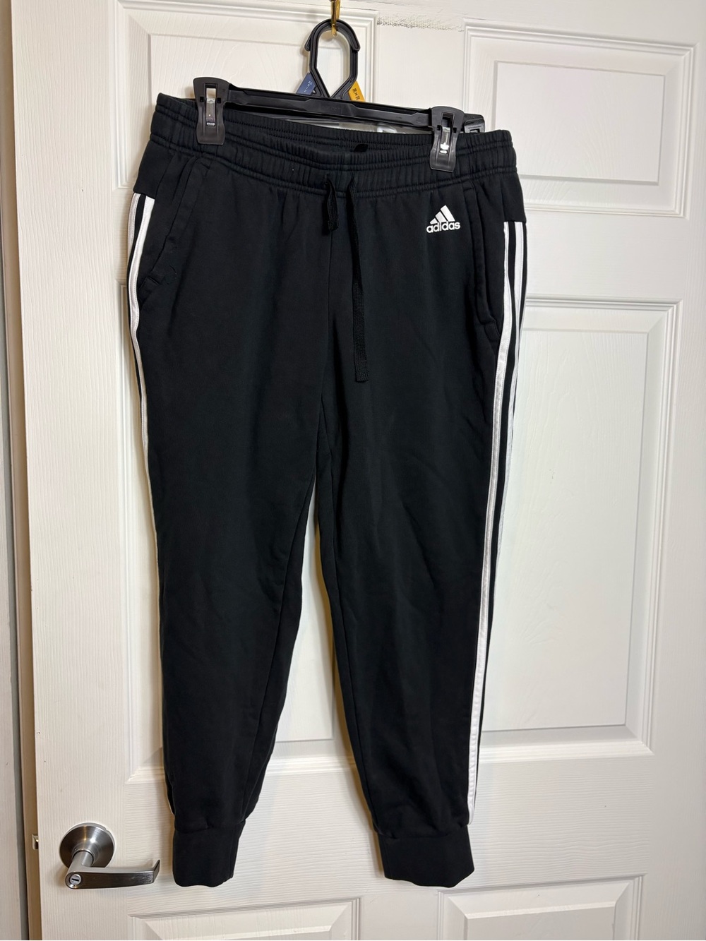 adidas women’s Black Jogger Pants with White Stripes